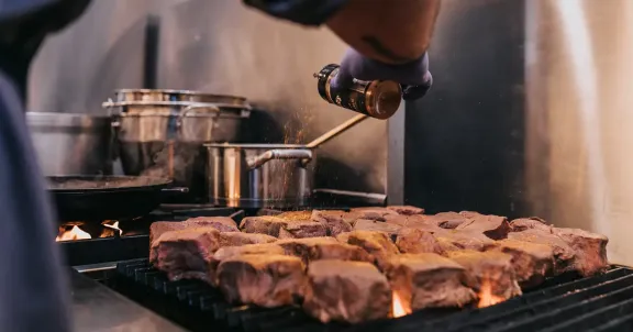 chef seasoning steaks